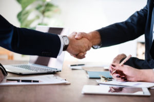 Two people shaking hands